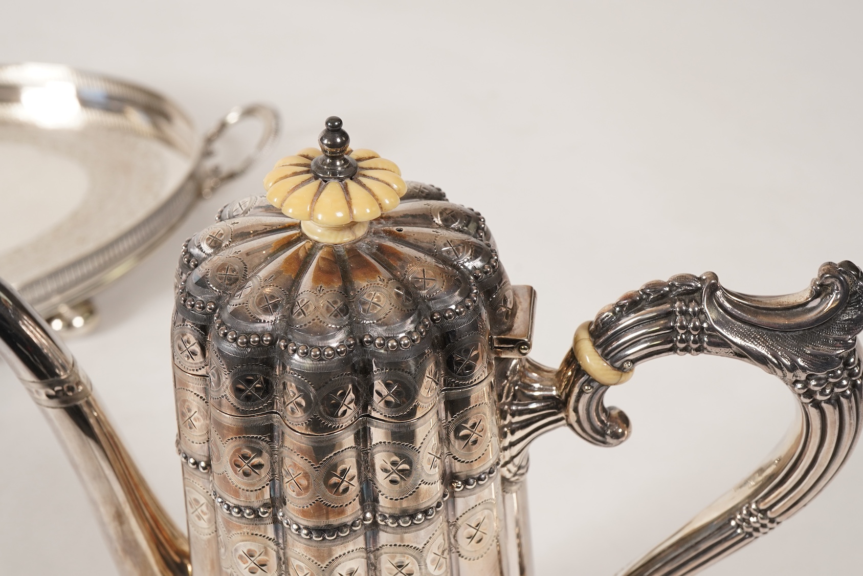 A late Victorian five piece silver tea and coffee service, all pieces with makers marks for John Edward Bingham and Walker & Hall